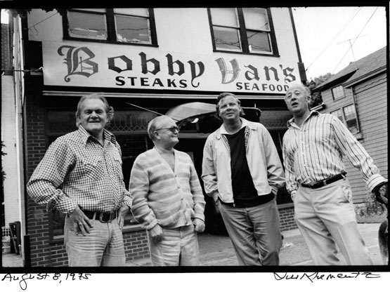 From left, writers James Jones, Truman Capote, Willie Morris and John Knowles stand in front of Bobby Van's Restaurant in 1975. Photo by Jill Krementz