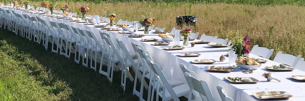 Share the Harvest 10th Annual BBQ Benefit - Tables Set in a Field