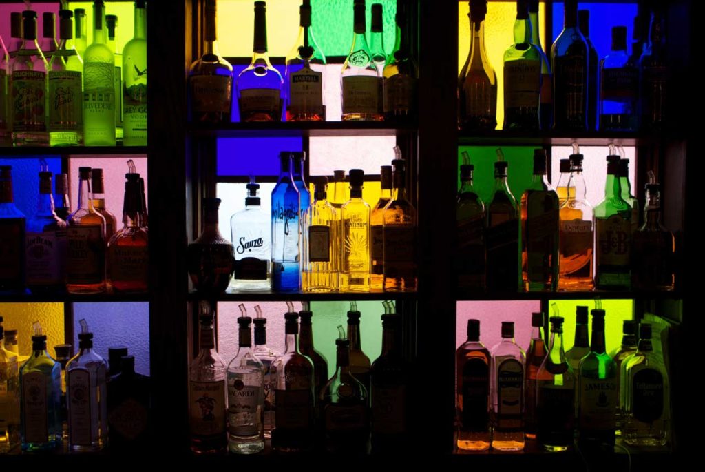 Rowdy Hall Colored Glass Windows with Bottles